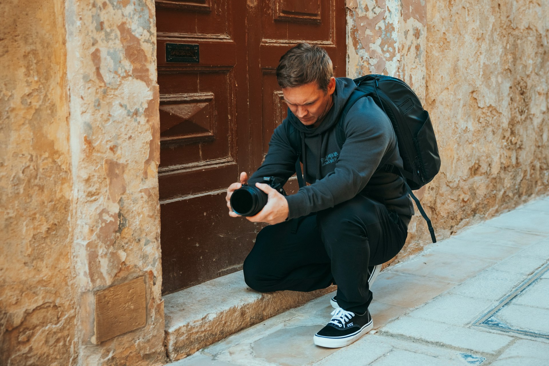 Photographer shooting photos during a production visit
